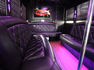pink lighting inside a party bus