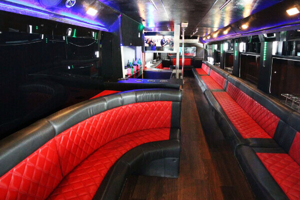 Limo bus with black and red leather seats
