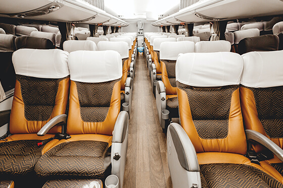Charter bus interior with 2 rows of seats